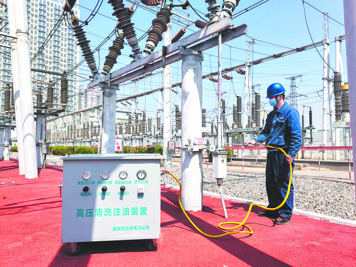 國(guó)網(wǎng)邯鄲供電公司:帶電清洗注油裝置 讓隔離開關(guān)清洗高效又便捷